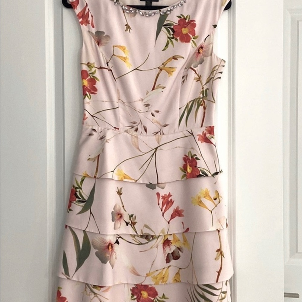 Pink Ted Baker dress.